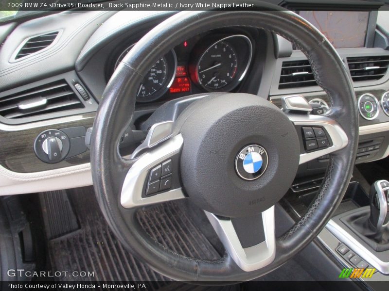Black Sapphire Metallic / Ivory White Nappa Leather 2009 BMW Z4 sDrive35i Roadster
