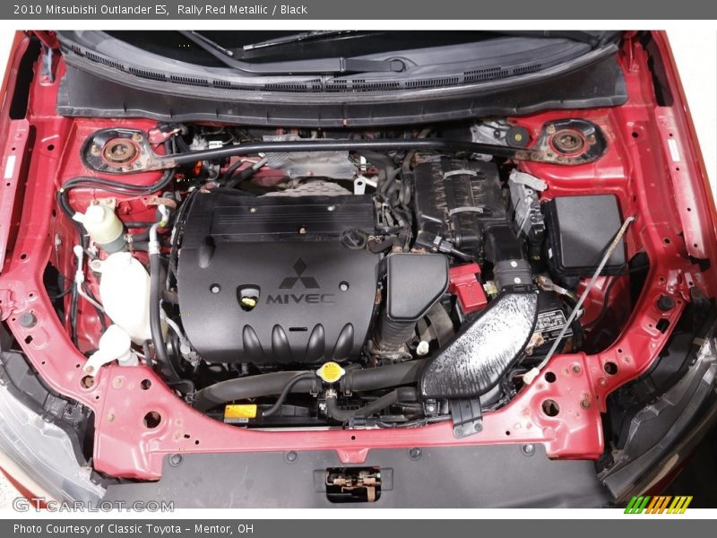 Rally Red Metallic / Black 2010 Mitsubishi Outlander ES