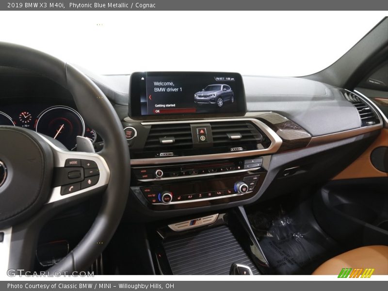 Phytonic Blue Metallic / Cognac 2019 BMW X3 M40i