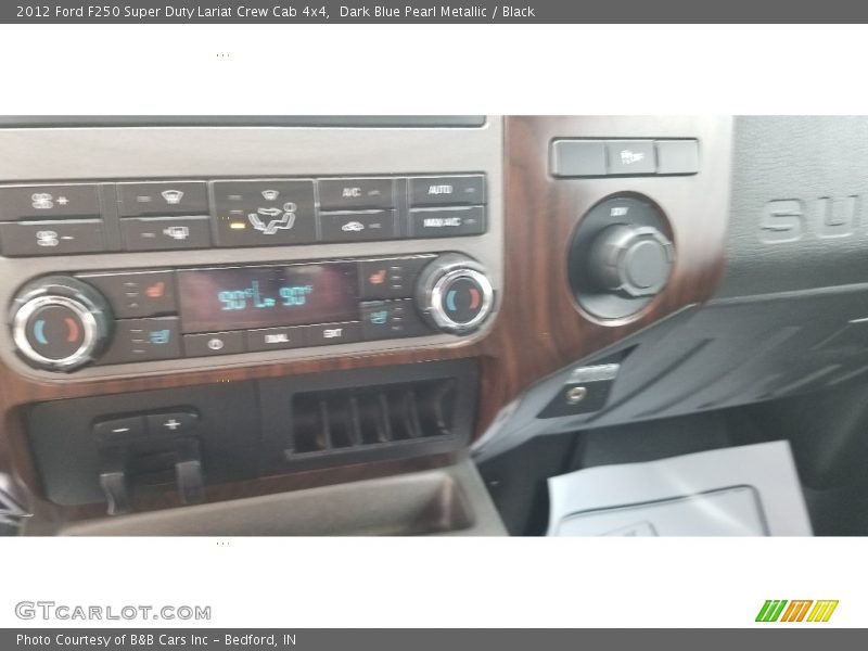 Dark Blue Pearl Metallic / Black 2012 Ford F250 Super Duty Lariat Crew Cab 4x4