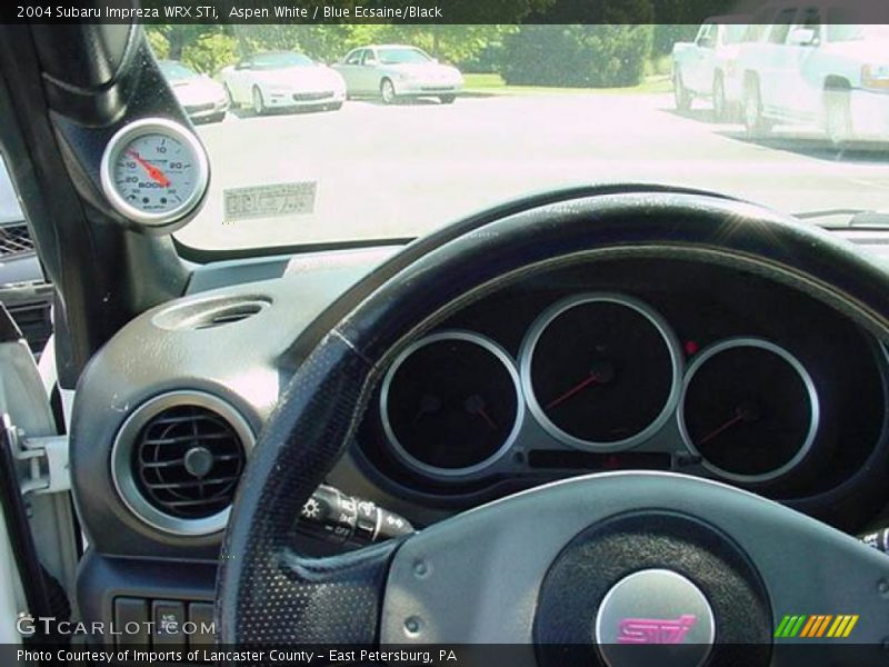 Aspen White / Blue Ecsaine/Black 2004 Subaru Impreza WRX STi