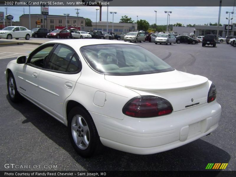 Ivory White / Dark Taupe 2002 Pontiac Grand Prix SE Sedan