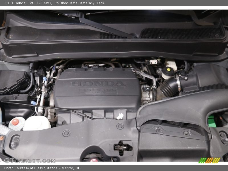 Polished Metal Metallic / Black 2011 Honda Pilot EX-L 4WD