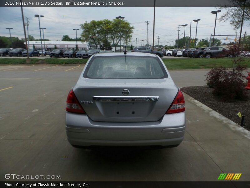 Brilliant Silver Metallic / Charcoal 2010 Nissan Versa 1.8 S Sedan