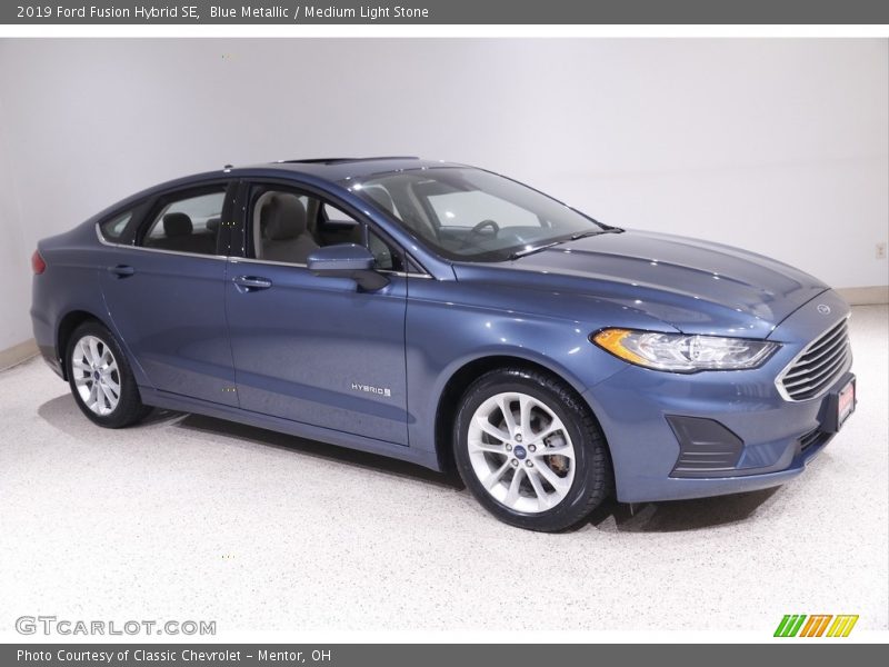 Blue Metallic / Medium Light Stone 2019 Ford Fusion Hybrid SE