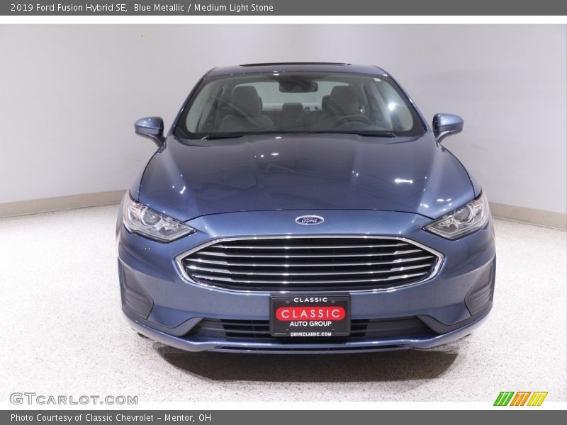 Blue Metallic / Medium Light Stone 2019 Ford Fusion Hybrid SE