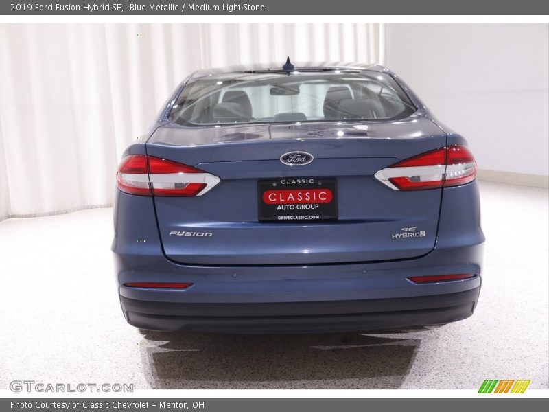 Blue Metallic / Medium Light Stone 2019 Ford Fusion Hybrid SE