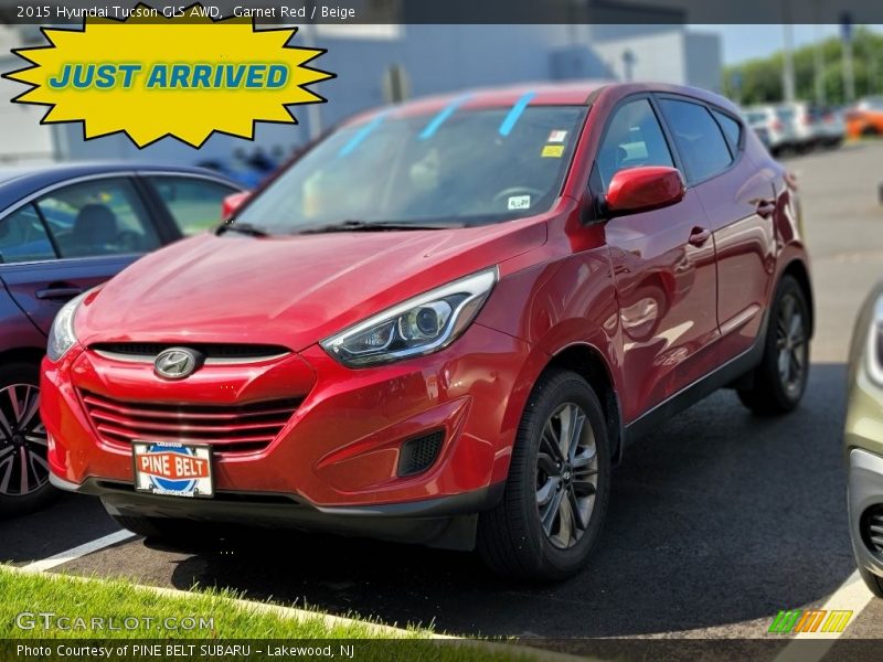 Garnet Red / Beige 2015 Hyundai Tucson GLS AWD
