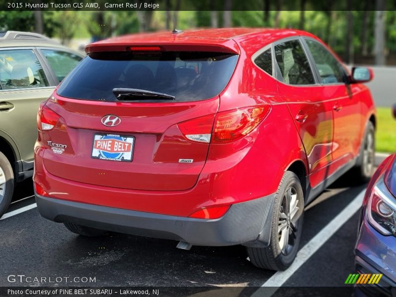 Garnet Red / Beige 2015 Hyundai Tucson GLS AWD
