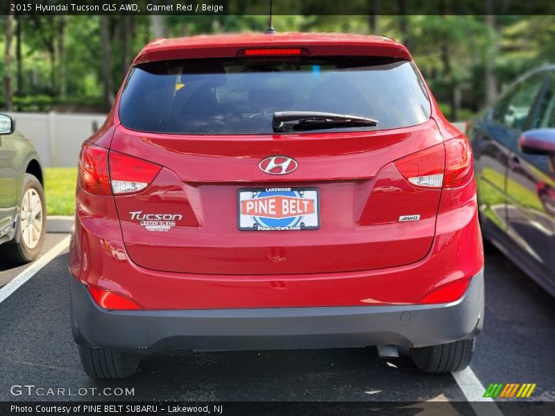 Garnet Red / Beige 2015 Hyundai Tucson GLS AWD