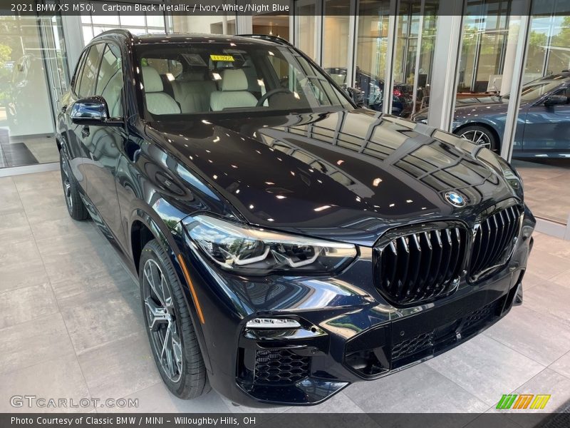 Carbon Black Metallic / Ivory White/Night Blue 2021 BMW X5 M50i