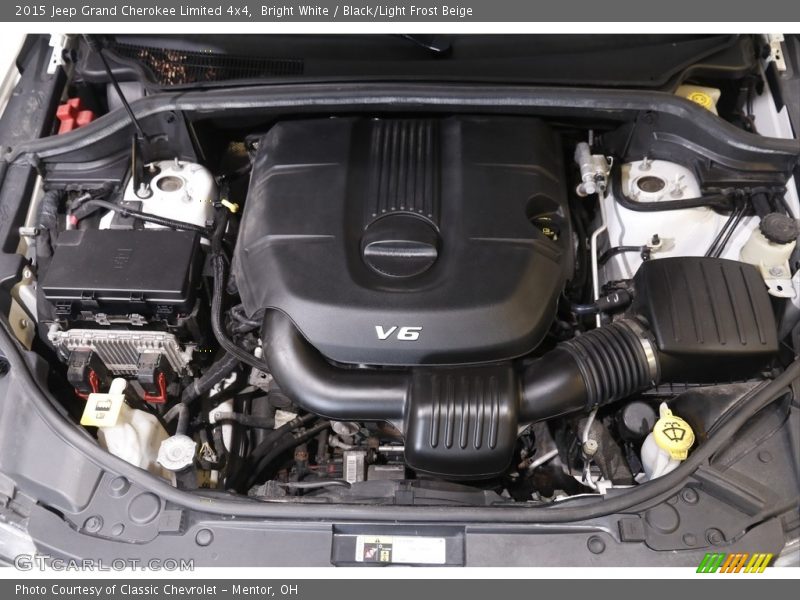 Bright White / Black/Light Frost Beige 2015 Jeep Grand Cherokee Limited 4x4