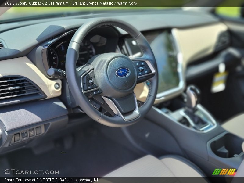 Brilliant Bronze Metallic / Warm Ivory 2021 Subaru Outback 2.5i Premium