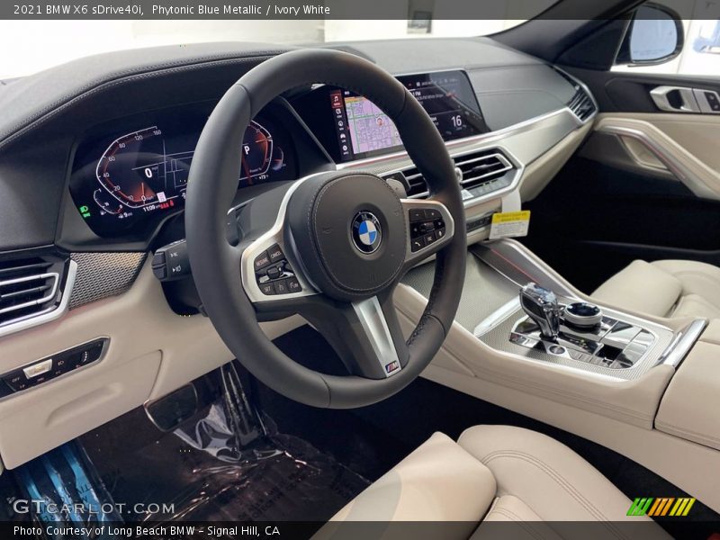 Phytonic Blue Metallic / Ivory White 2021 BMW X6 sDrive40i
