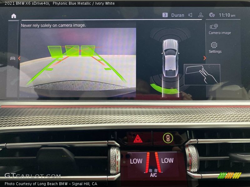 Phytonic Blue Metallic / Ivory White 2021 BMW X6 sDrive40i