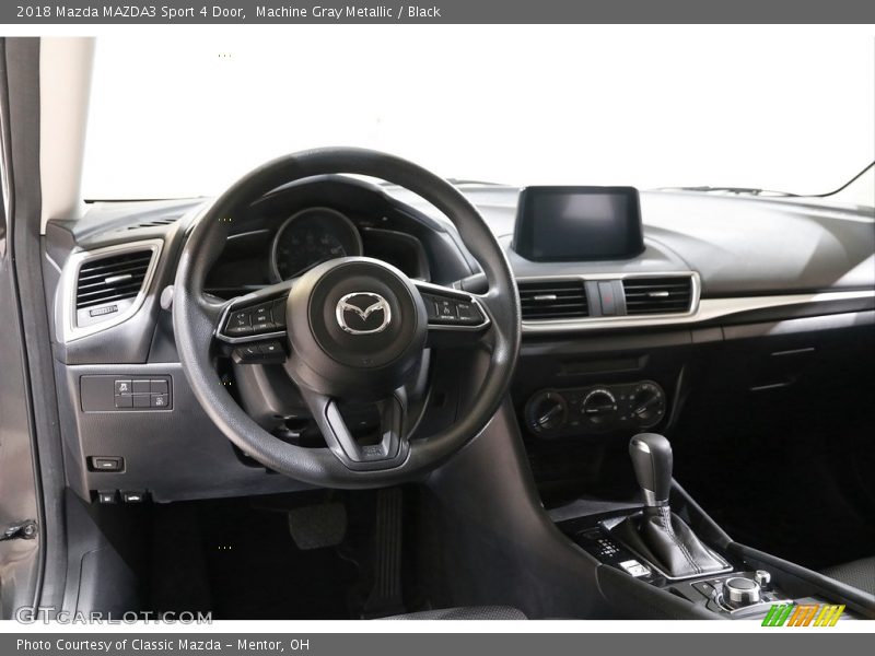 Machine Gray Metallic / Black 2018 Mazda MAZDA3 Sport 4 Door