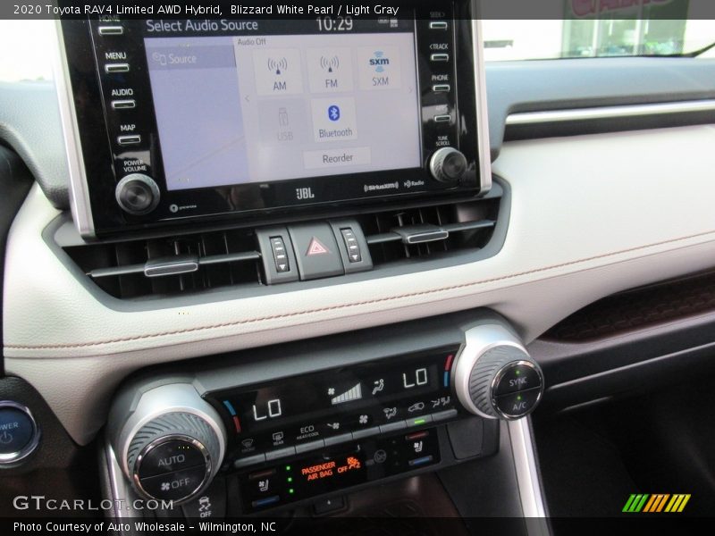 Blizzard White Pearl / Light Gray 2020 Toyota RAV4 Limited AWD Hybrid