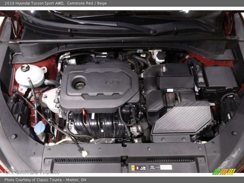 Gemstone Red / Beige 2019 Hyundai Tucson Sport AWD