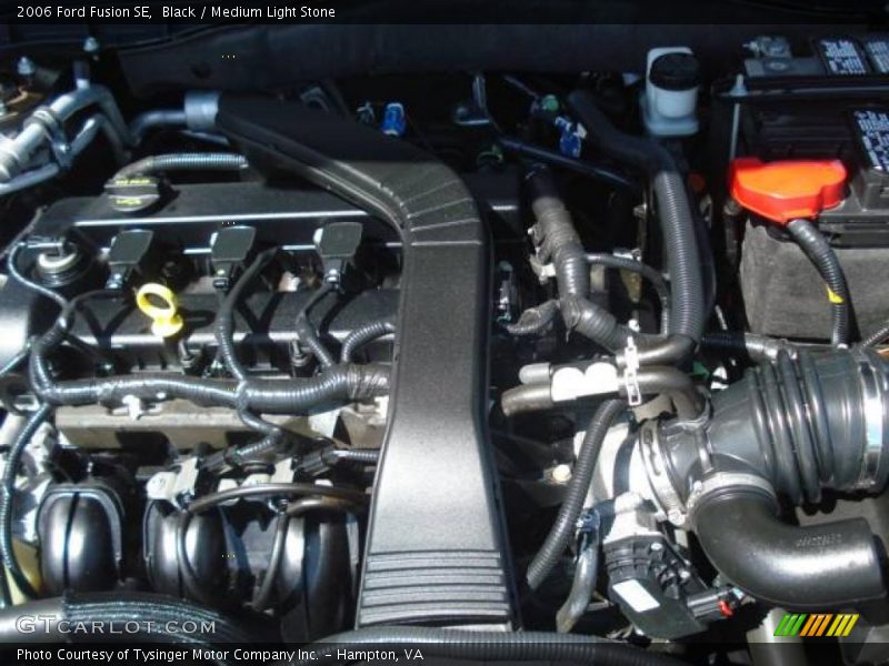 Black / Medium Light Stone 2006 Ford Fusion SE