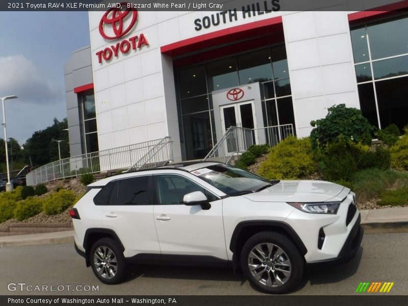 Blizzard White Pearl / Light Gray 2021 Toyota RAV4 XLE Premium AWD