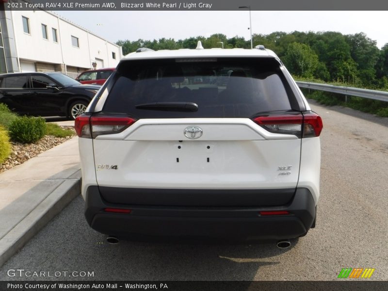 Blizzard White Pearl / Light Gray 2021 Toyota RAV4 XLE Premium AWD