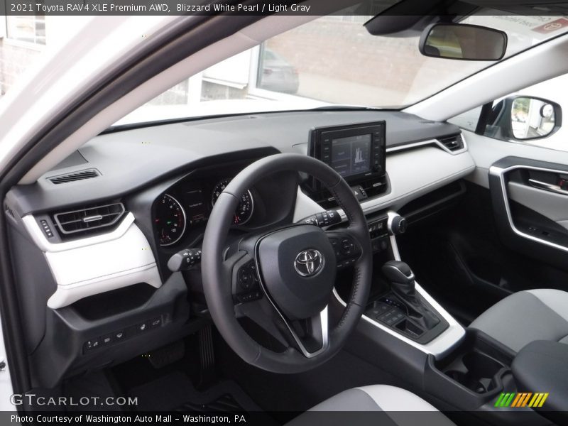 Blizzard White Pearl / Light Gray 2021 Toyota RAV4 XLE Premium AWD