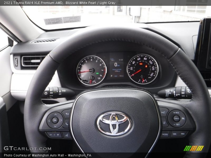Blizzard White Pearl / Light Gray 2021 Toyota RAV4 XLE Premium AWD