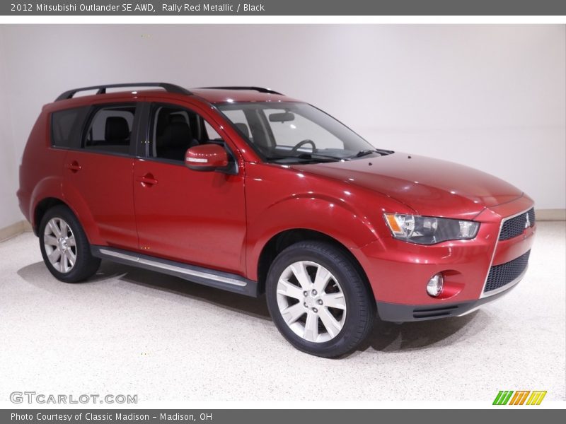 Rally Red Metallic / Black 2012 Mitsubishi Outlander SE AWD