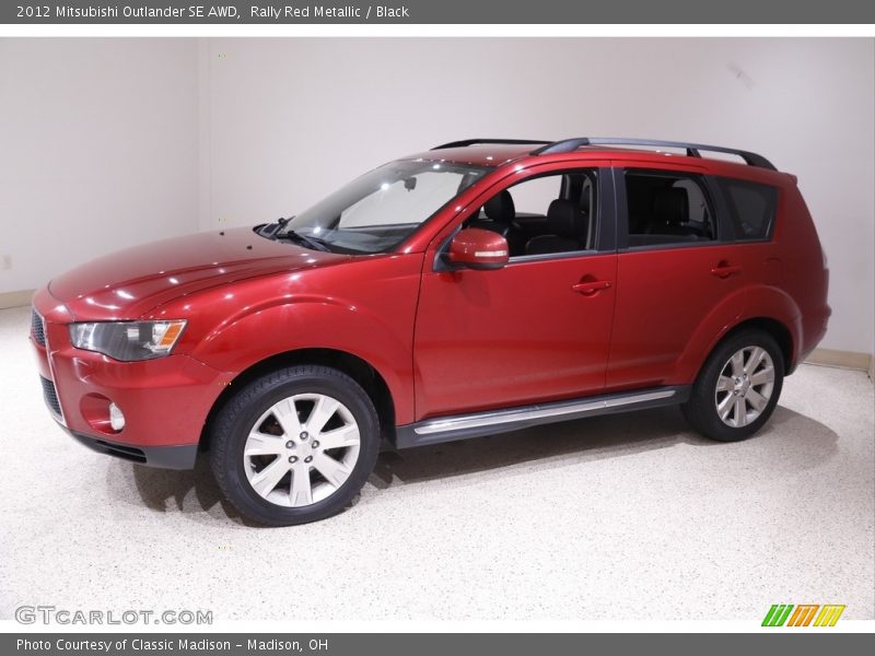 Rally Red Metallic / Black 2012 Mitsubishi Outlander SE AWD