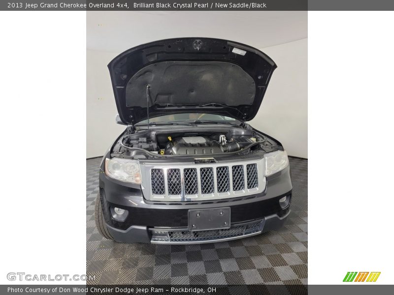 Brilliant Black Crystal Pearl / New Saddle/Black 2013 Jeep Grand Cherokee Overland 4x4