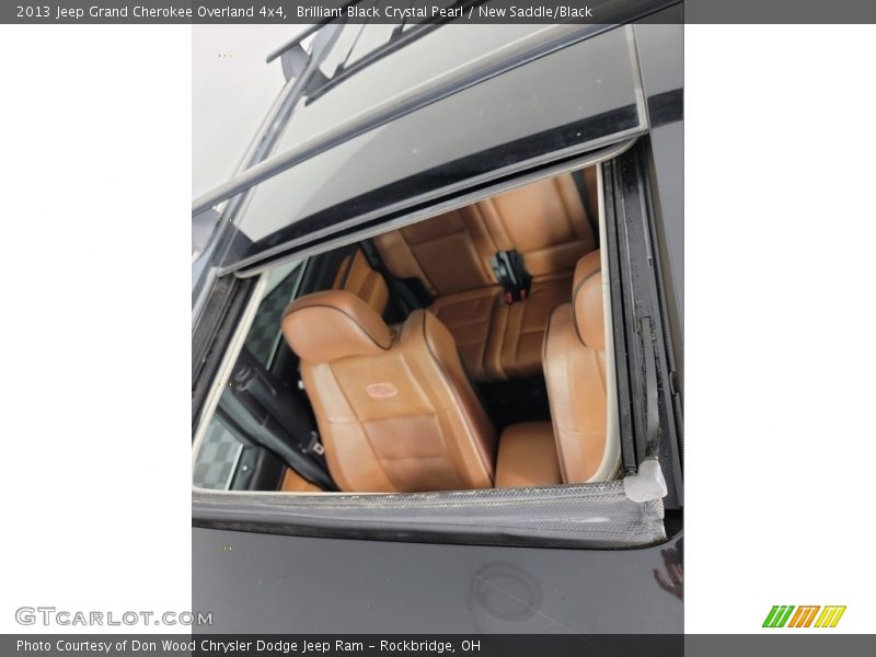 Brilliant Black Crystal Pearl / New Saddle/Black 2013 Jeep Grand Cherokee Overland 4x4