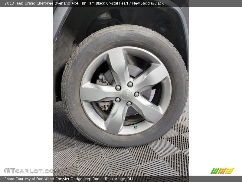 Brilliant Black Crystal Pearl / New Saddle/Black 2013 Jeep Grand Cherokee Overland 4x4