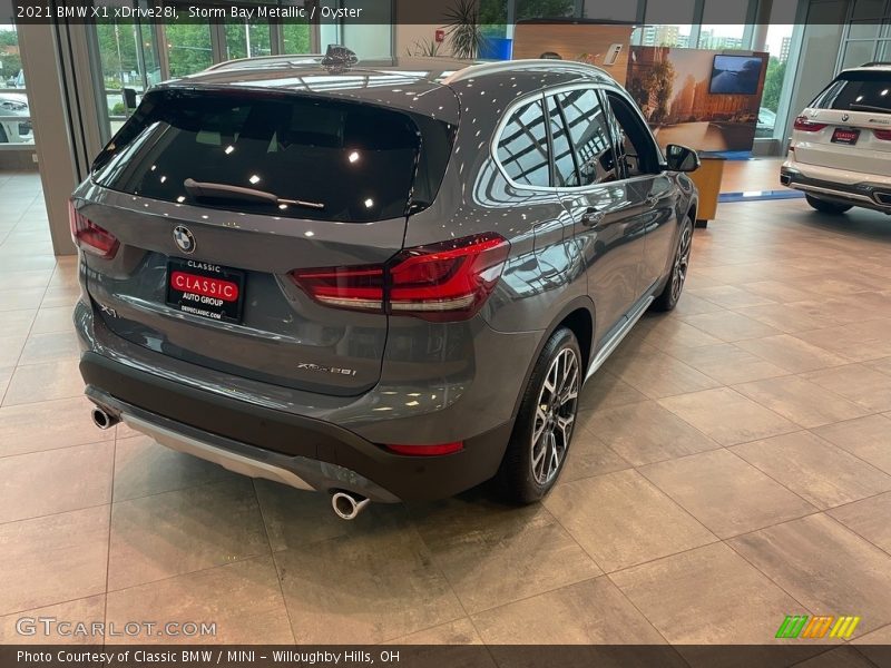 Storm Bay Metallic / Oyster 2021 BMW X1 xDrive28i