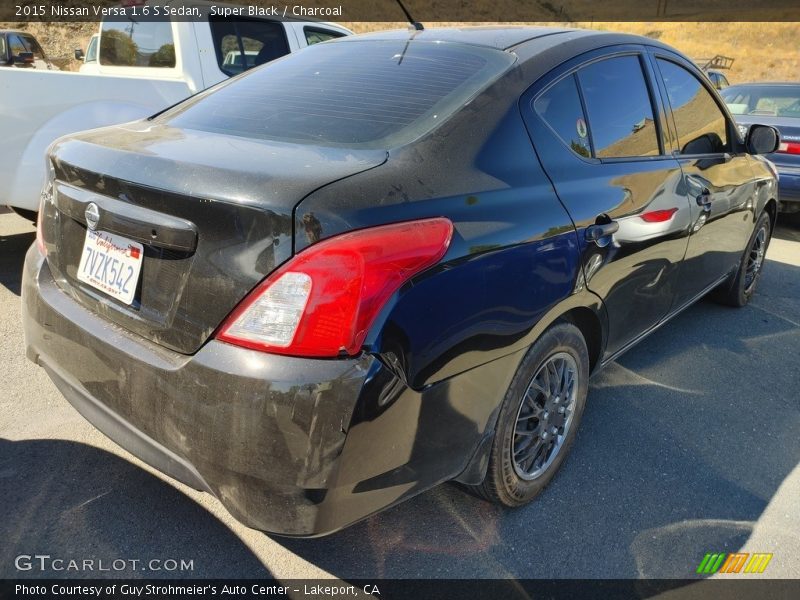 Super Black / Charcoal 2015 Nissan Versa 1.6 S Sedan