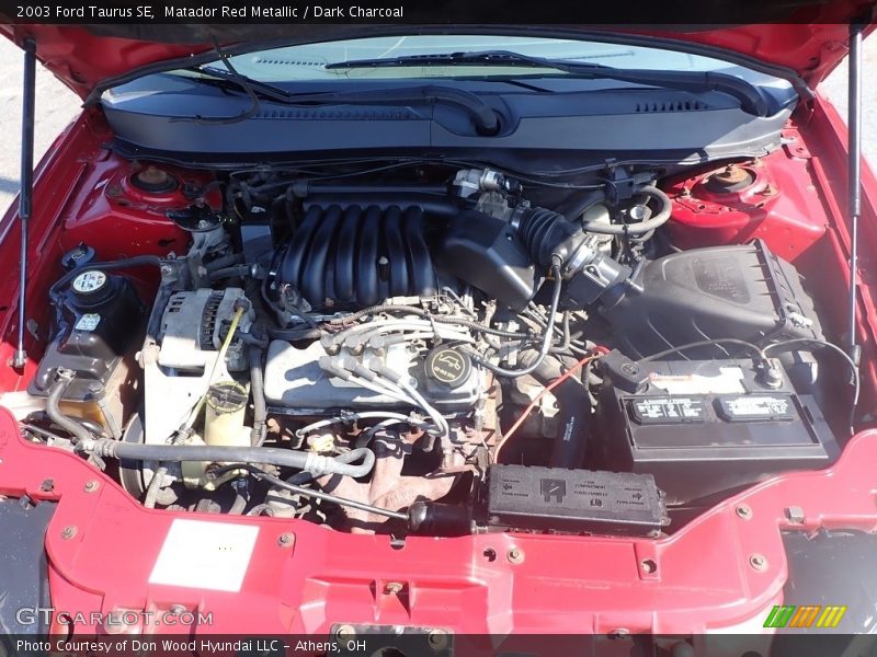 Matador Red Metallic / Dark Charcoal 2003 Ford Taurus SE