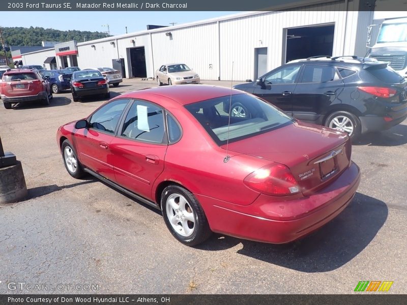 Matador Red Metallic / Dark Charcoal 2003 Ford Taurus SE