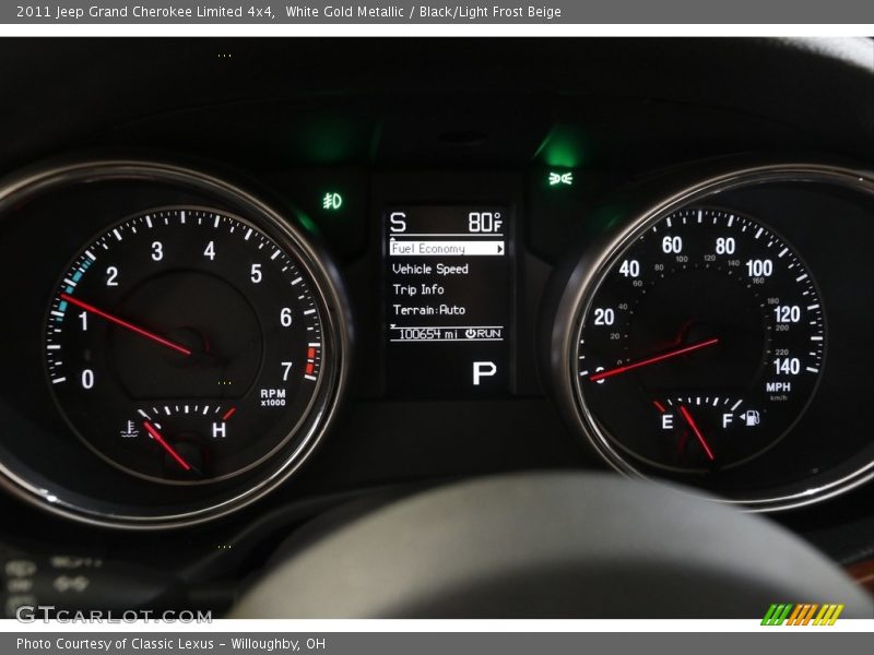 White Gold Metallic / Black/Light Frost Beige 2011 Jeep Grand Cherokee Limited 4x4