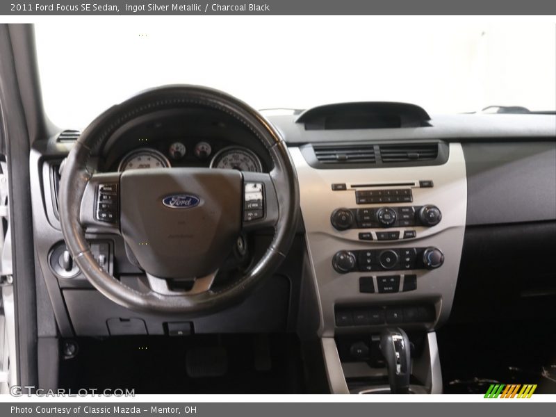 Ingot Silver Metallic / Charcoal Black 2011 Ford Focus SE Sedan
