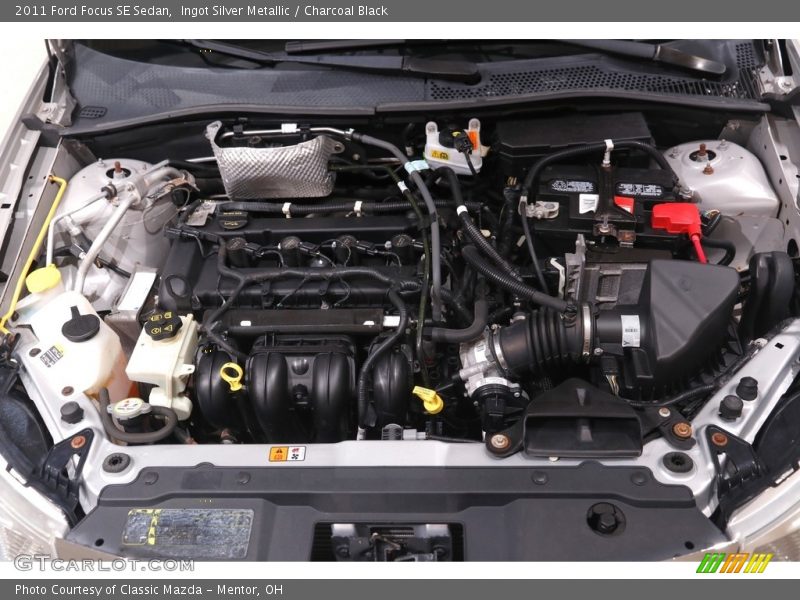 Ingot Silver Metallic / Charcoal Black 2011 Ford Focus SE Sedan
