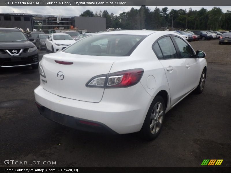 Crystal White Pearl Mica / Black 2011 Mazda MAZDA3 i Touring 4 Door