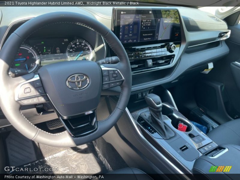 Midnight Black Metallic / Black 2021 Toyota Highlander Hybrid Limited AWD