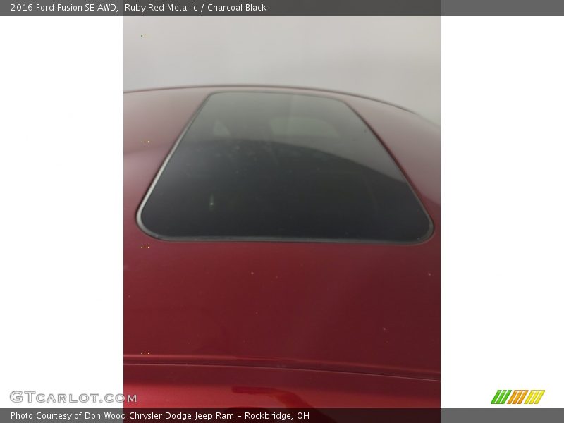 Ruby Red Metallic / Charcoal Black 2016 Ford Fusion SE AWD