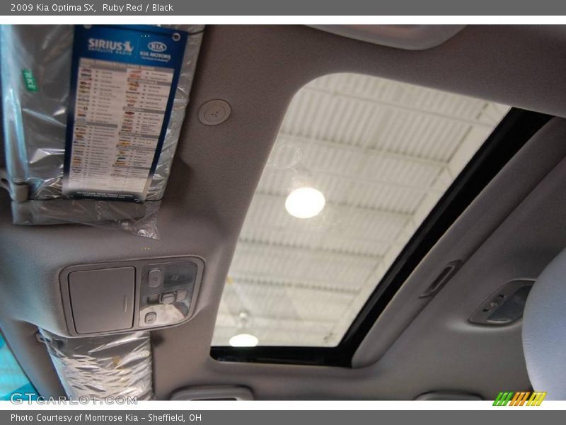 Ruby Red / Black 2009 Kia Optima SX