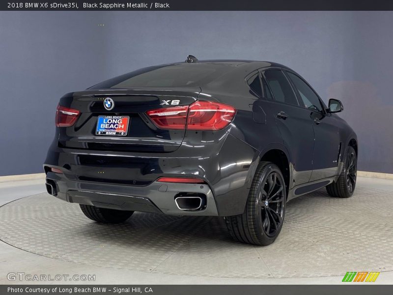 Black Sapphire Metallic / Black 2018 BMW X6 sDrive35i