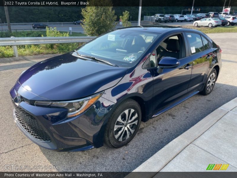 Front 3/4 View of 2022 Corolla LE Hybrid