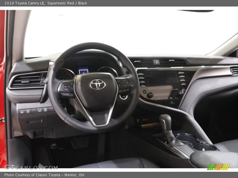 Supersonic Red / Black 2019 Toyota Camry LE