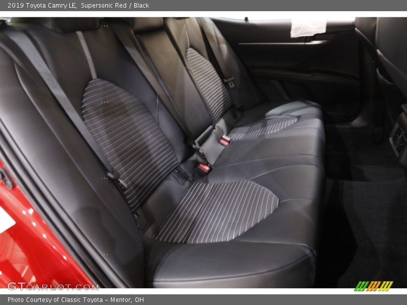Supersonic Red / Black 2019 Toyota Camry LE