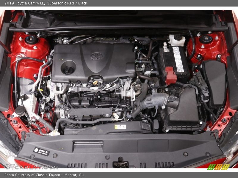 Supersonic Red / Black 2019 Toyota Camry LE