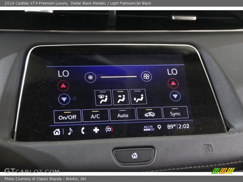 Stellar Black Metallic / Light Platinum/Jet Black 2019 Cadillac XT4 Premium Luxury
