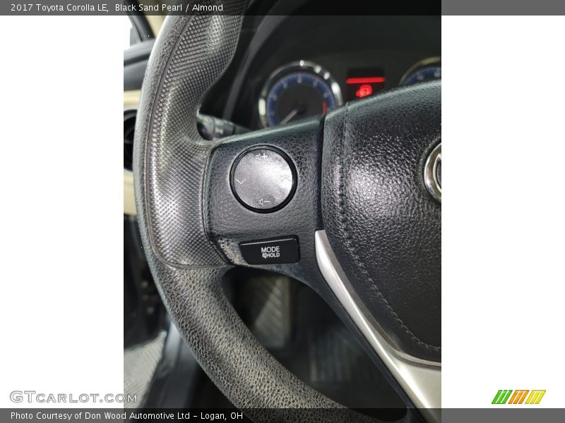 Black Sand Pearl / Almond 2017 Toyota Corolla LE